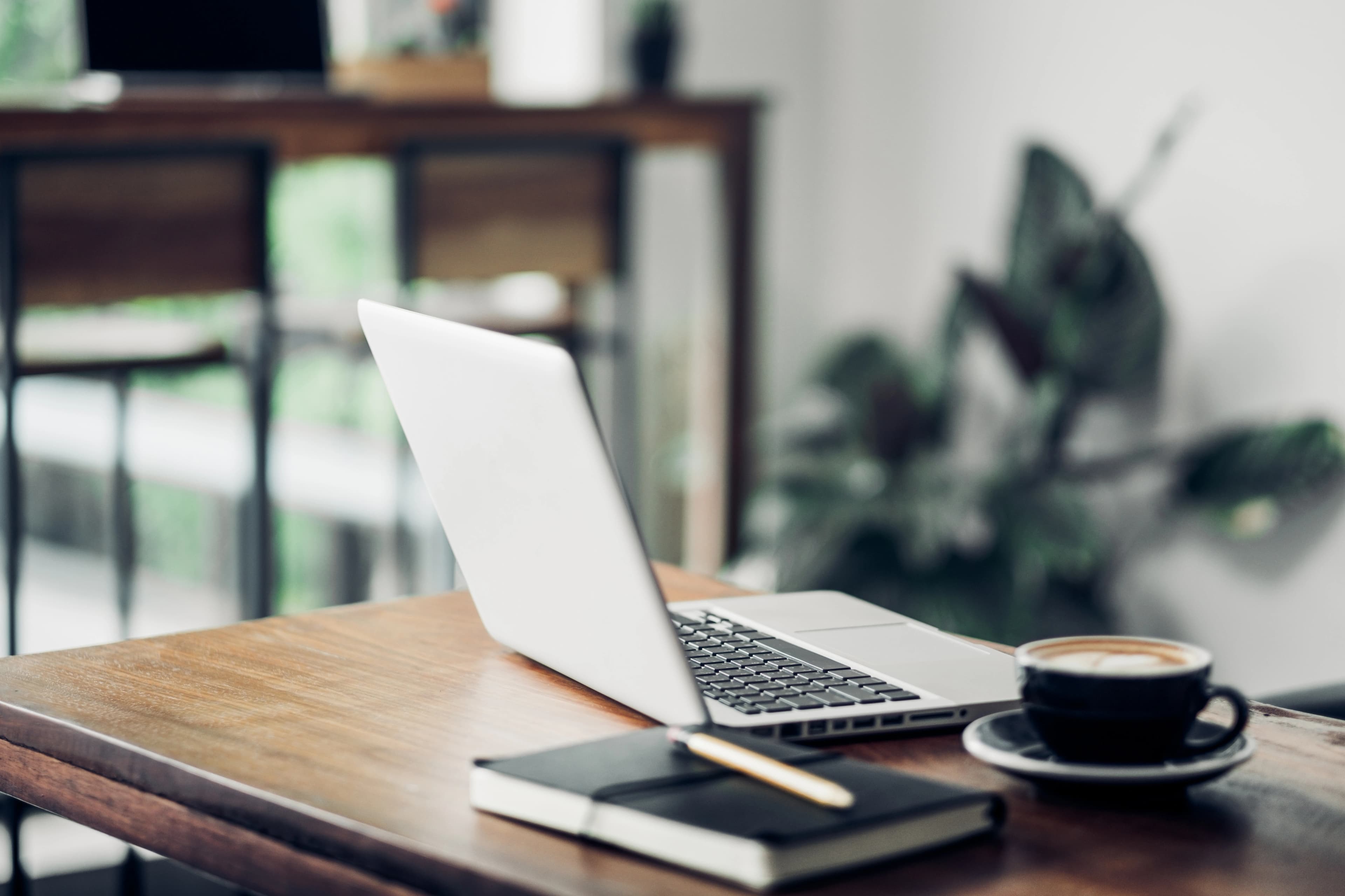 Coffee and laptop workspace