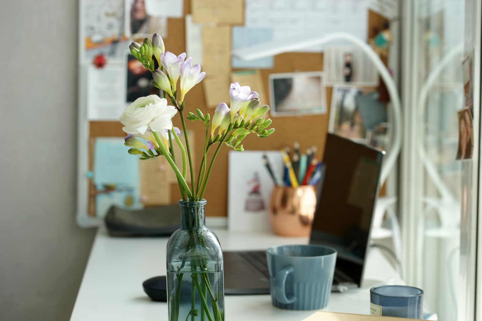 Professional office workspace with flowers